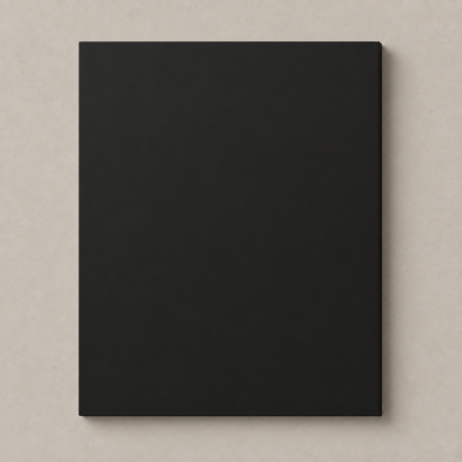 Matte Black Cabinet Door on Warm Concrete